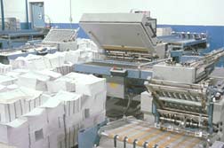 picture of stacks of printer paper and printer