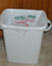 picture of trash can with liner; link for environmental article, How to Cut Your Spending on Plastic Trash Bags and Keep a Few Out of The Landfills