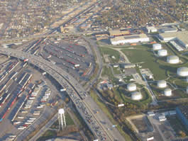 picture of parking lots, roads, and buildings