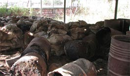 picture of leaking barrels of chemicals at Bhopal