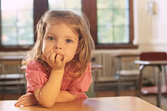 picture of young girl in classroom