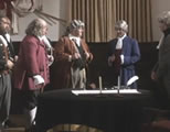 funny declaration of independence video link; thumb of founding fathers gathered around a signing table