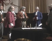 funny declaration of independence video link; thumb of founding fathers gathered around a signing table
