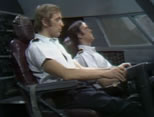 graham chapman and john cleese as airline pilots in cockpit; click to see animation/video at external site; opens in new window