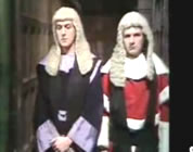 funny judges video link; thumb of Eric Idle and Michael Palin as poofy judges