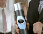 funny coal video link; thumb of man in suit holding can of 'clean coal' air freshener