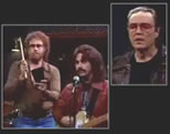 funny rock music video link; thumb of Christopher Walken and other actors in music studio