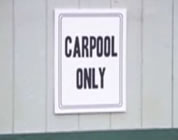 thumb of sign for parking space, says carpool only